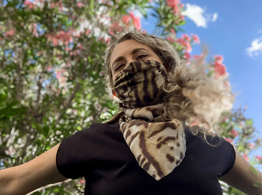 The Story Behind those Masked Scarves